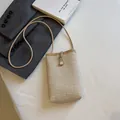 Mini woven straw crossbody phone bag with pearl button closure and leather strap - Khaki With White Buckle