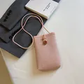 Pink woven mini crossbody phone bag with floral button and slim strap for women - Pink With Brown Buckle