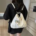 Sac à dos triangulaire blanc crème chic avec charm nuage pour les déplacements - Blanc Cassé