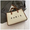 Large capacity canvas tote bag with brown leather trim and Paris print lettering - Large Beige and Brown