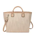 Beige woven bucket tote bag with brown leather handles and adjustable shoulder strap - Beige