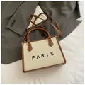 Large beige straw tote bag with brown leather trim and Paris logo print - Small Beige and Brown