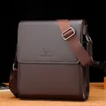 Men's business messenger bag in deep brown textured leather with adjustable strap - Vertical Brown