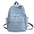 Retro light blue denim canvas backpack with front zipper pocket and dark blue straps - Light Blue