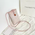 Pink floral jacquard crossbody phone bag with floral charm and slim drawstring strap - Brown Buckle Pink