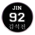 Round black K-pop pin featuring JIN 92 text and Korean name design for fans - Pop Band Member Style (JIN)