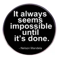 Round Nelson Mandela quote pin with black background and silver metal edge - Nelson Mandela Quote