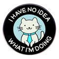 Funny white cat enamel pin with I Have No Idea What I Am Doing text and blue tie - Staff Cat