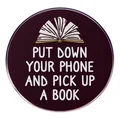 Enamel lapel pin with 'Put Down Your Phone and Pick Up a Book' text and book illustration - Put Down Your Phone And Read A Book / Purple