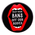 Feminist enamel pin featuring red lips and Keep Your Bans Off Our Bodies slogan - Red Lips Slogan Style