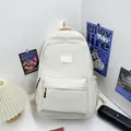 Minimalist beige nylon backpack with large capacity and durable lightweight design - White