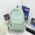 Minimalist mint green student backpack with large capacity and durable nylon material - Green