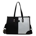 Elegante borsa tote in tela bianca e nera con finiture in pelle e tracolla a righe - Nero