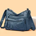 Borsa a tracolla in pelle PU lavata blu scuro con tasche multiple e dettagli intrecciati - Blu