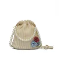 Stroh-Beuteltasche mit bunten Blumen und Perlengriff für den Sommer-Look - Perlengriff / Beigefarbener Blumen-Stil