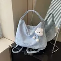 Light blue marble pattern tote bag with removable strap and cute cloud charm accessory - Blue