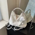 White marble pattern hobo tote bag with a plush cloud charm and adjustable straps - Off-white