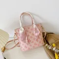 Pink bucket bag with floral monogram print and decorative scarf handle for women - Pink