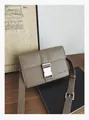 Chic khaki faux leather crossbody bag with silver buckle and adjustable strap - Gray