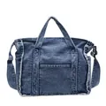 Dark blue denim tote bag with frayed edges and adjustable strap in variant view - Light Blue
