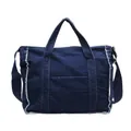 Deep blue denim tote bag with frayed edges and external pocket in vintage style - Dark Blue