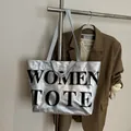 Borsa tote argento metallizzato con scritta Women Tote e tracolla in tessuto grigio - Argento