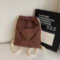 Brown woven texture drawstring backpack for women with white cotton rope straps - Dark Brown