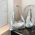 Chic silver metallic hobo bag featuring all-over silver stud rivets in Y2K style - Silver