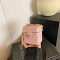 Pink quilted leather mini chain bag with golden ball adjustment and floral clasp - Pink