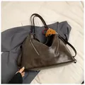 Vintage dark coffee large tote bag with dual zippers and plush dog charm detail - With Pendant / Brown