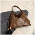 Brown vintage faux leather tote backpack with stylish metal zippers and adjustable strap - No Pendant / Brown