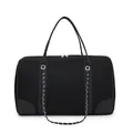 Detailed macro view of black mesh fabric handbag with silver chain strap and leather trim - Black