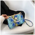 Sac à main rétro motif serpent multicolore avec poignée en perles et cadre en métal - Bleu