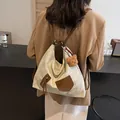 Beige canvas backpack with brown leather trim and cute bear charm shown on back - 37*12*34 / Off-white Without Pendant
