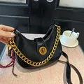 Black crescent hobo bag with gold chain and lychee pattern leather texture - Black With Rabbit Pendant
