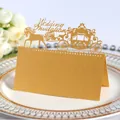 Élégante carte de placement de mariage dorée découpée au laser avec carrosse royal - Doré