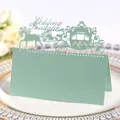 Mint green laser cut royal carriage wedding place card with intricate hollow design - Sea Blue