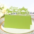 Laser-cut light green wedding place card featuring a European carriage and horses design - Bright Green