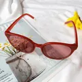 Occhiali da sole rotondi rossi per bambini con lenti rosso scuro per ragazzi e ragazze - Rosso