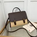 Vintage-Schultertasche aus braunem Leder und beigem Canvas mit goldenen Schnallen - Khaki & Braun