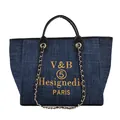 Borsa tote in denim blu con ricami gialli, manici in pelle nera e catena dorata - Blu scuro