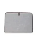 Detail of grey canvas document bag with brown leather trim and metallic snap fastener - Gray