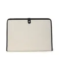 Detail of canvas laptop sleeve with contrast black trim and metallic snap fastener - White