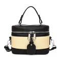 Borsa a secchiello bicolore beige e nera con tracolla rimovibile e dettagli argentati - Nero e Bianco