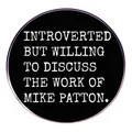Introverted But Willing to Discuss Mike Patton enamel pin with white text on black background - Introverted Discuss Work Slogan Style