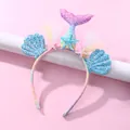 Detail of mermaid tail headband with shiny sequins, colorful shells and starfish - Gradient