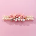 Bandeau bébé avec nœuds floraux roses et dentelle élastique beige sur fond rose - Bandeau Papillon Rose