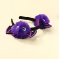 Close-up of purple bat-themed Halloween headband with faux fur and cartoon eyes - Purple Bat Style