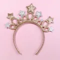 Close-up of glitter star crown headband with gold and silver sequins on pink background - Crown Star Headband