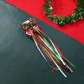 Detailansicht der Weihnachts-Haarschleife mit Pailletten, Bommeln und Schneeflocken-Bändern - Rot Grün Patchwork